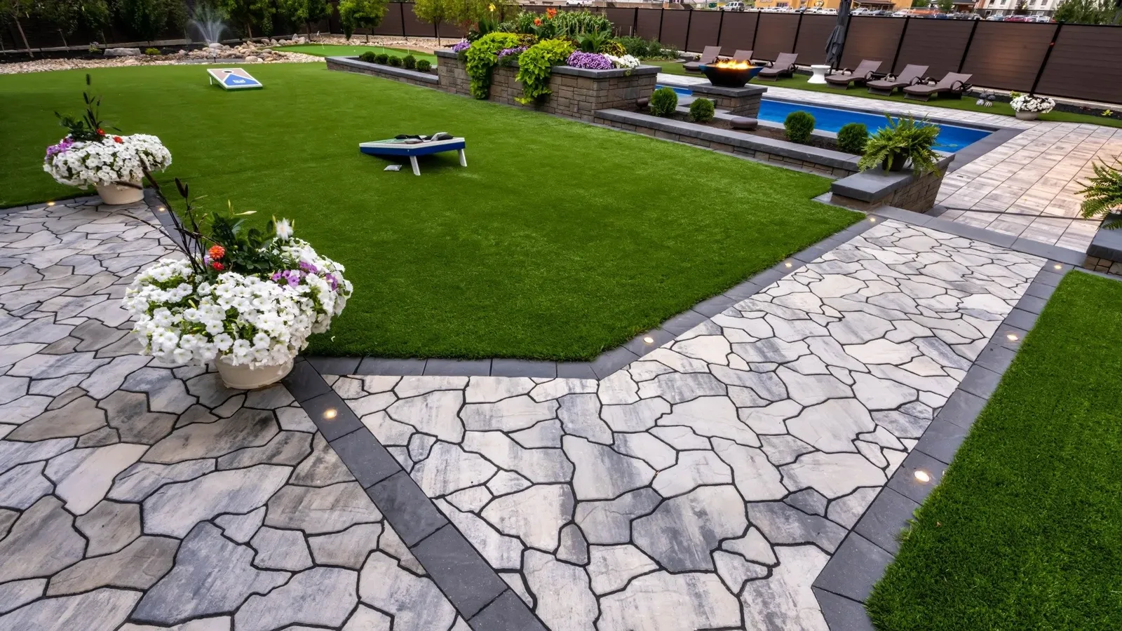 Paver and artificial turf landscaping by Brick Lawn Landscaping in Edmonton